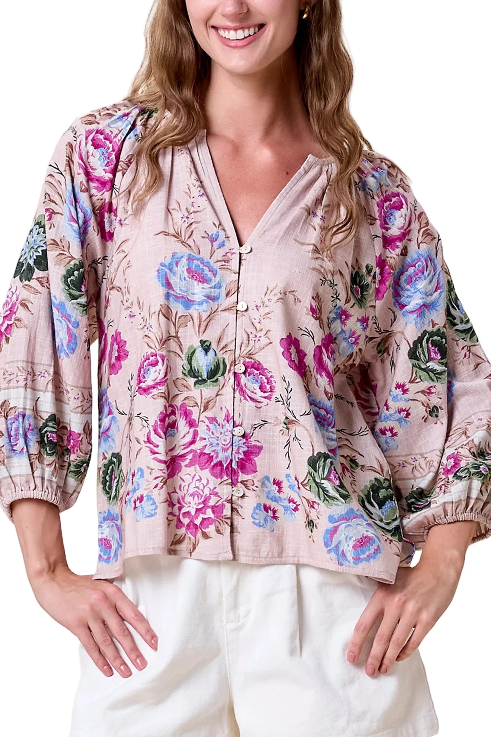 Woman wearing Cleobella Luella Blouse with a soft, flowy silhouette and feminine detailing for an effortlessly polished look.