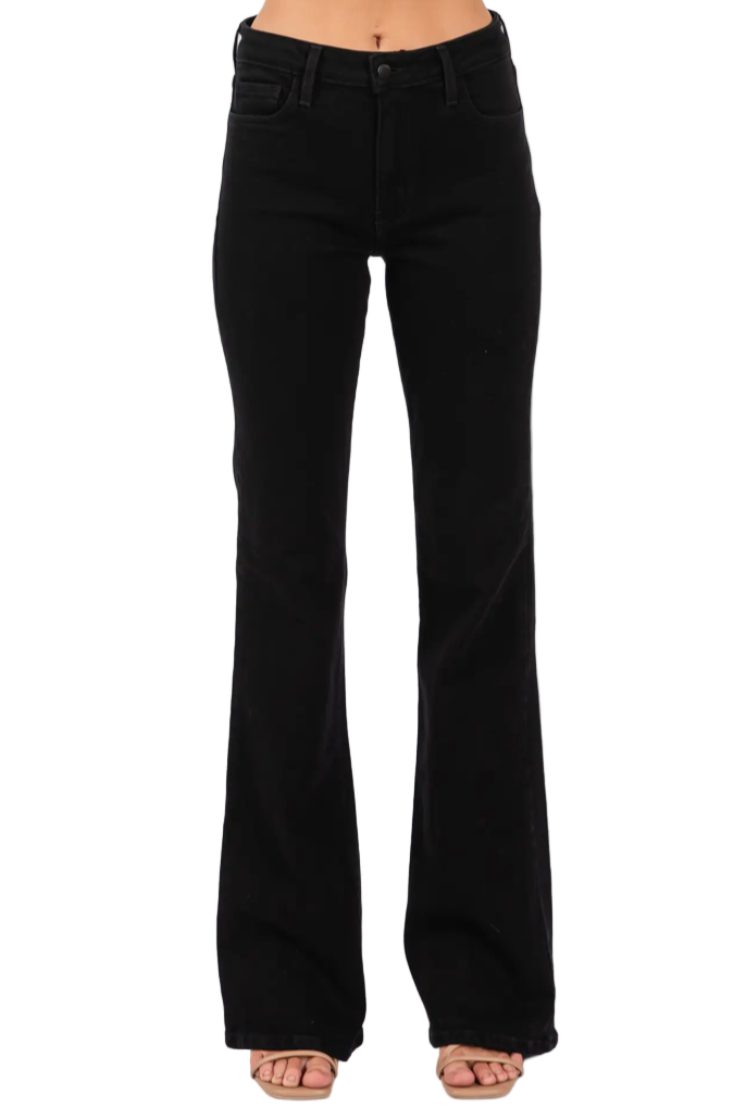 Black flared jeans on a white background