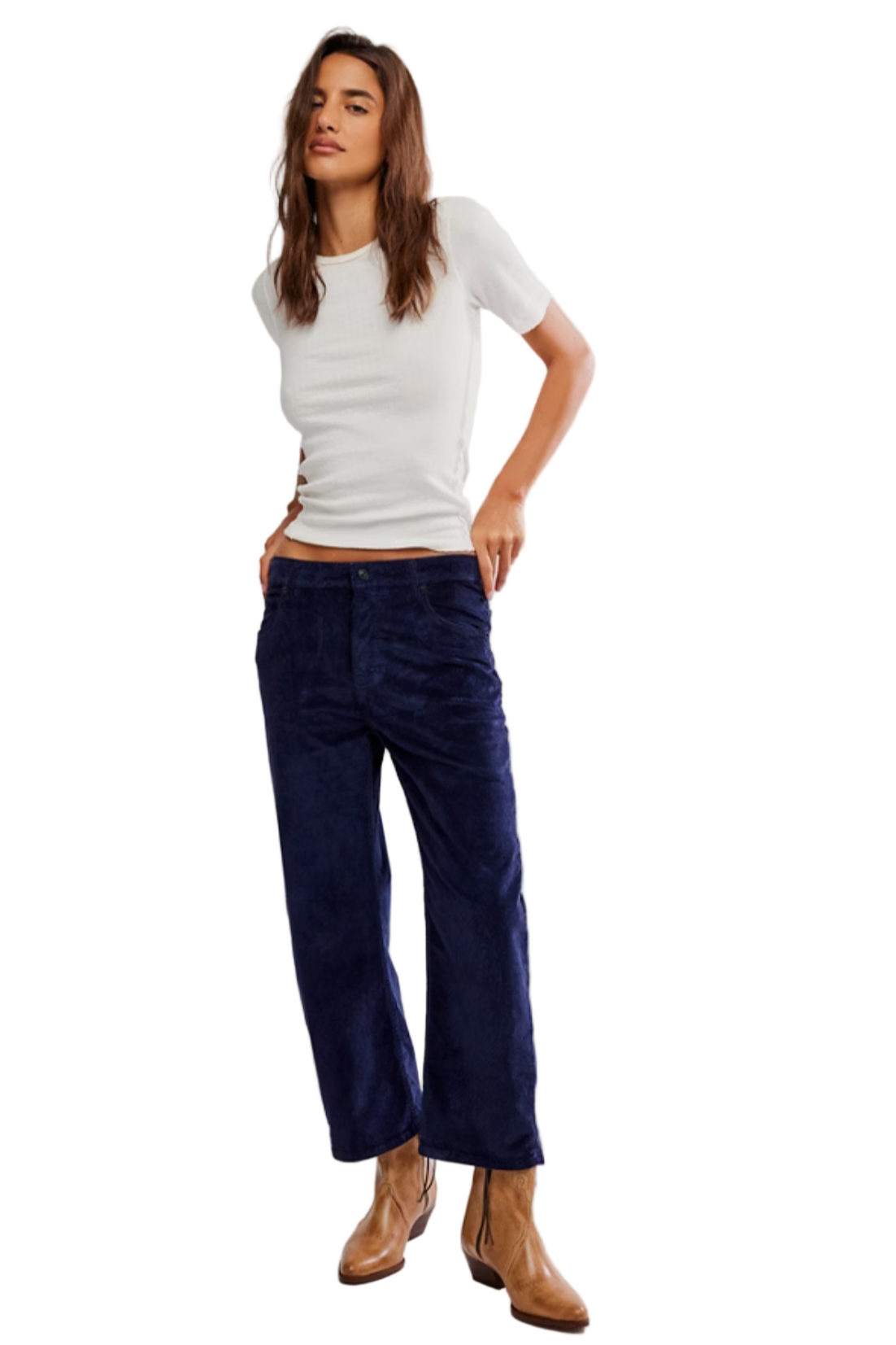 Woman wearing a white t-shirt and dark blue jeans on a plain background