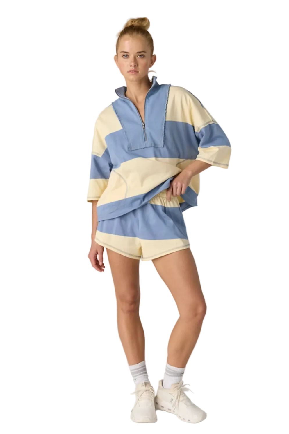 Woman wearing Free People Retro Rugby Set in Blue Ash and Pina Cola featuring a relaxed sporty fit and retro-inspired striped design.