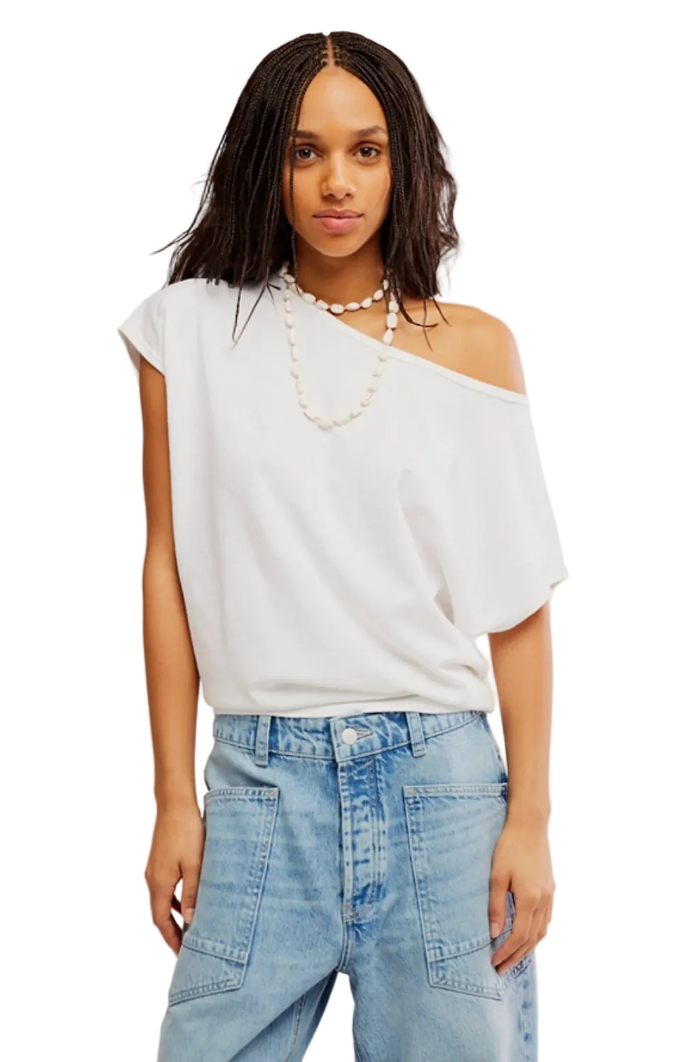 Woman wearing Free People Peggy Tee with relaxed fit, wide boat neckline, and lightweight cotton fabric.