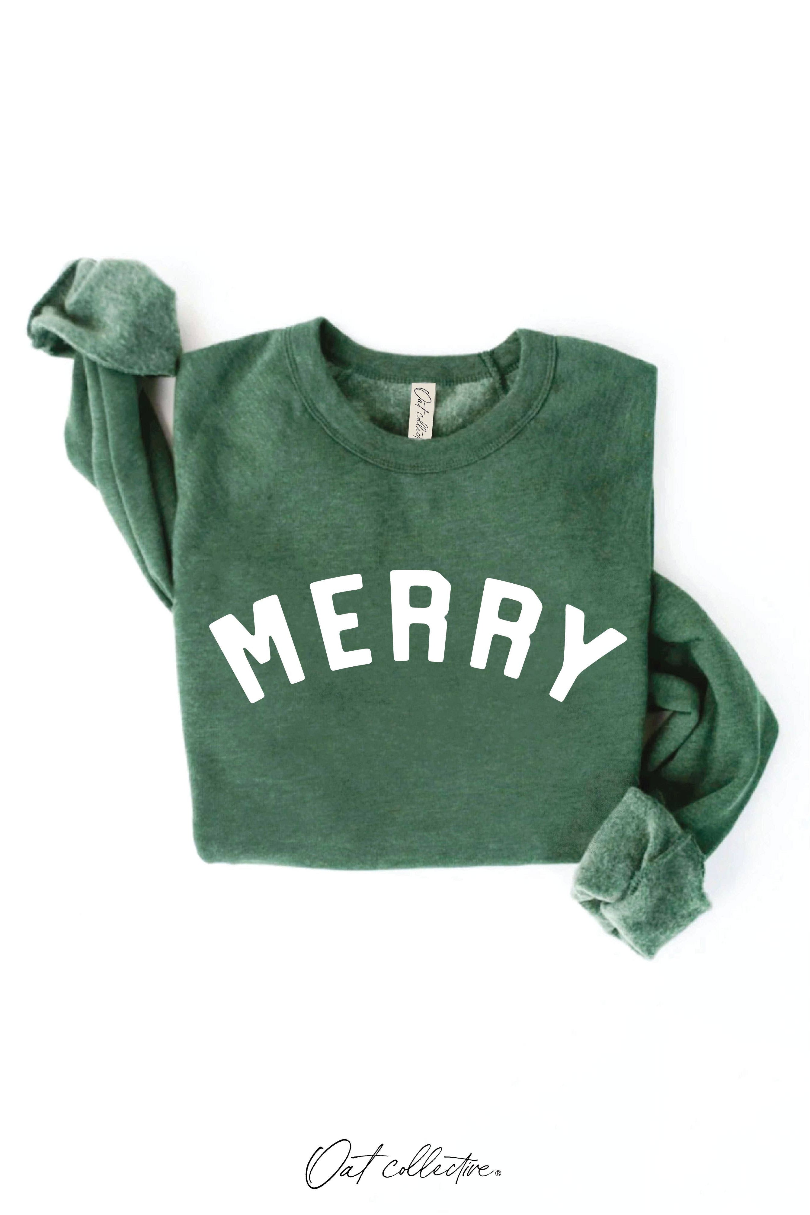 Green sweatshirt with 'MERRY' text on a white background
