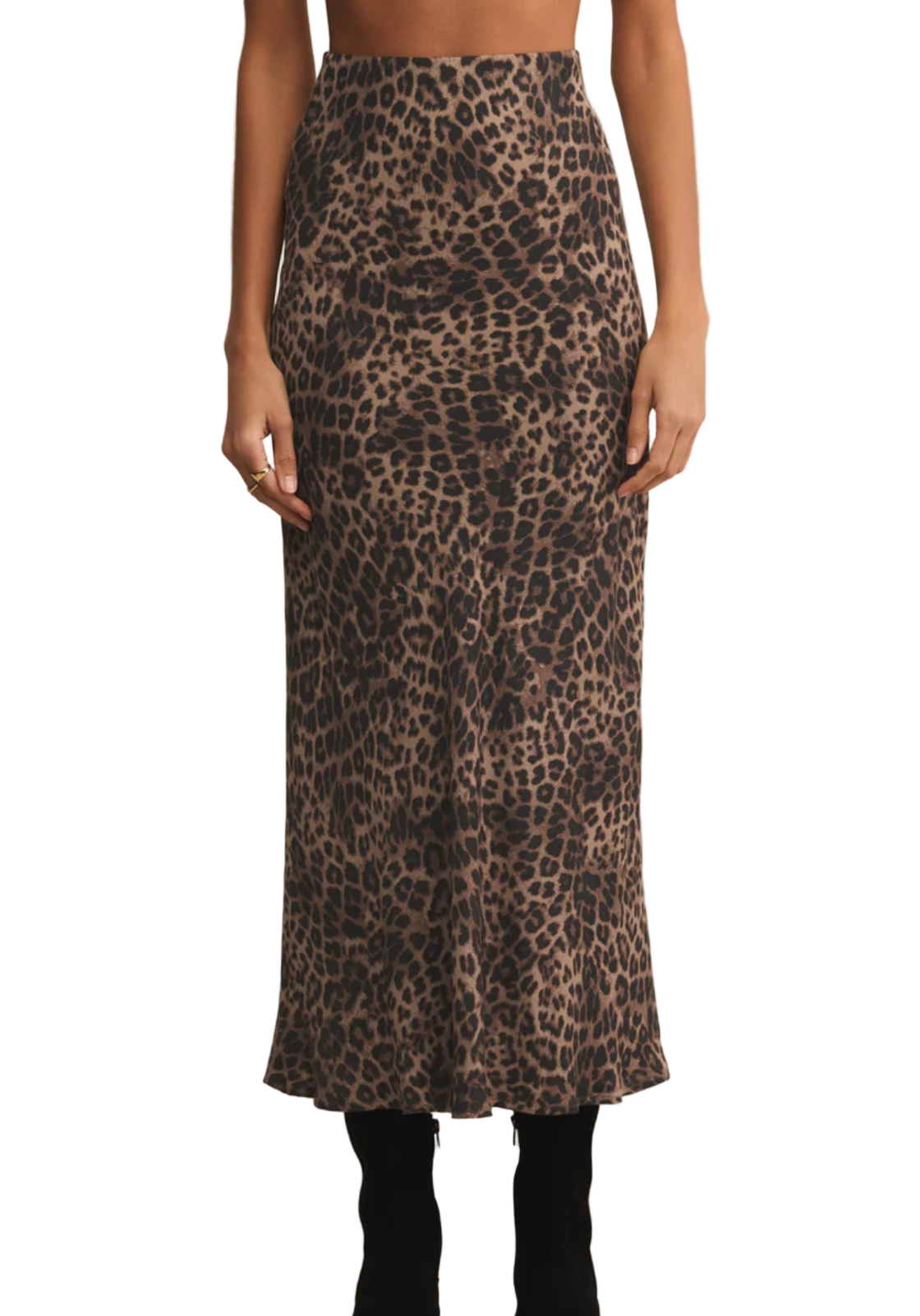 Leopard print skirt worn by a person on a beige background