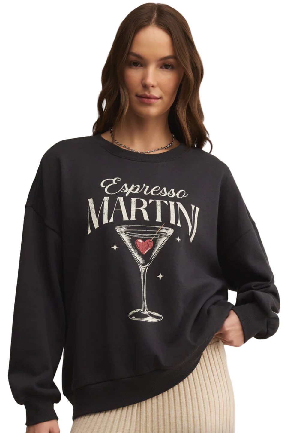 Person wearing a black sweatshirt with 'Espresso Martini' design on a white background