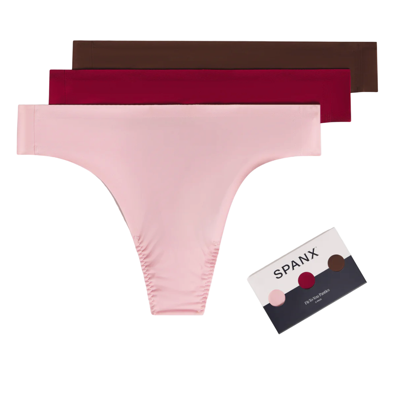 Pink and red underwear with Spanx packaging on a white background