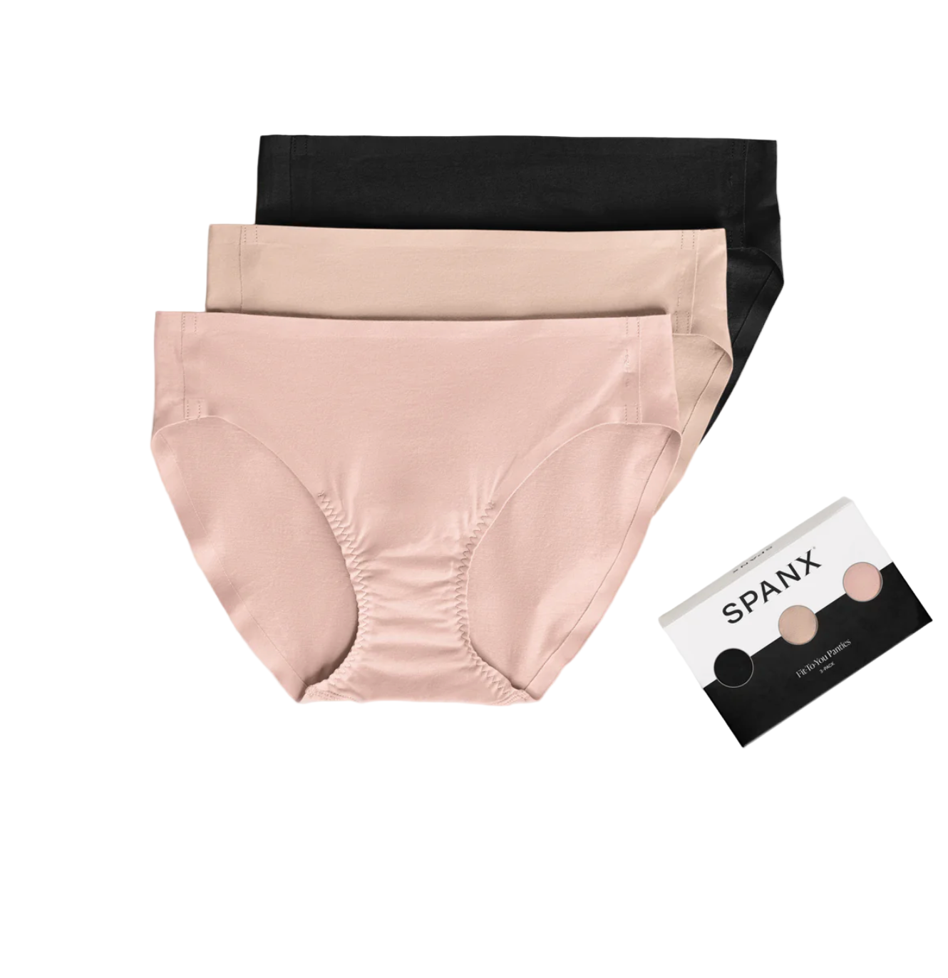 Two pairs of women's underwear, one black and one beige, with a Spanx packaging box on a light gray background.