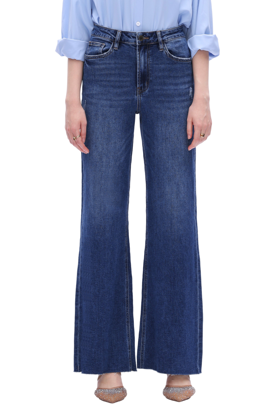 Person wearing blue jeans and a light blue shirt on a white background