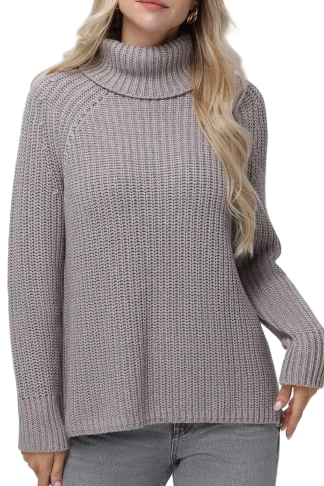 Person wearing a gray knitted sweater against a white background