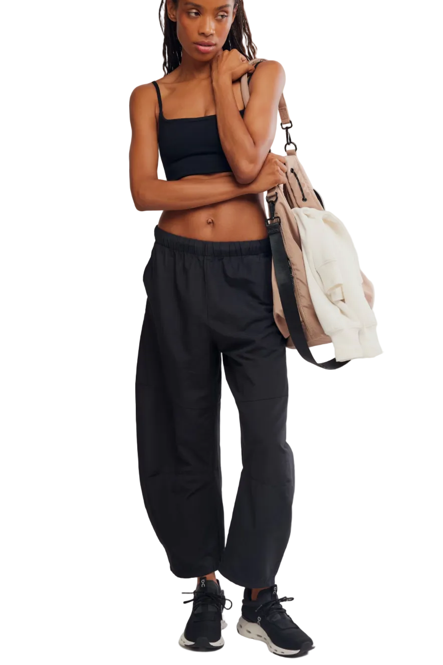 Woman wearing FP Movement Game Day Pant in a relaxed sporty fit with an easy pull-on waistband and casual everyday styling.