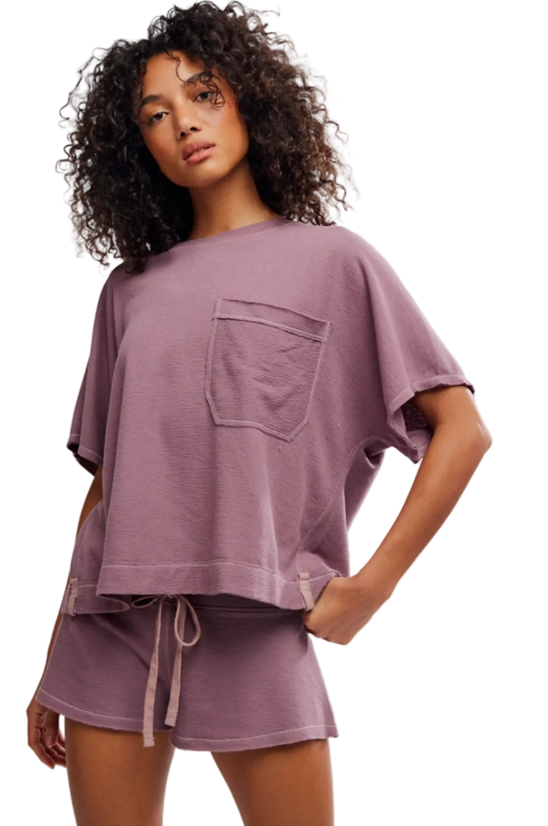 Free People Staycation Sleep Tee with boxy fit, soft knit fabric, draped sleeves, and front pouch pocket for relaxed lounge style
