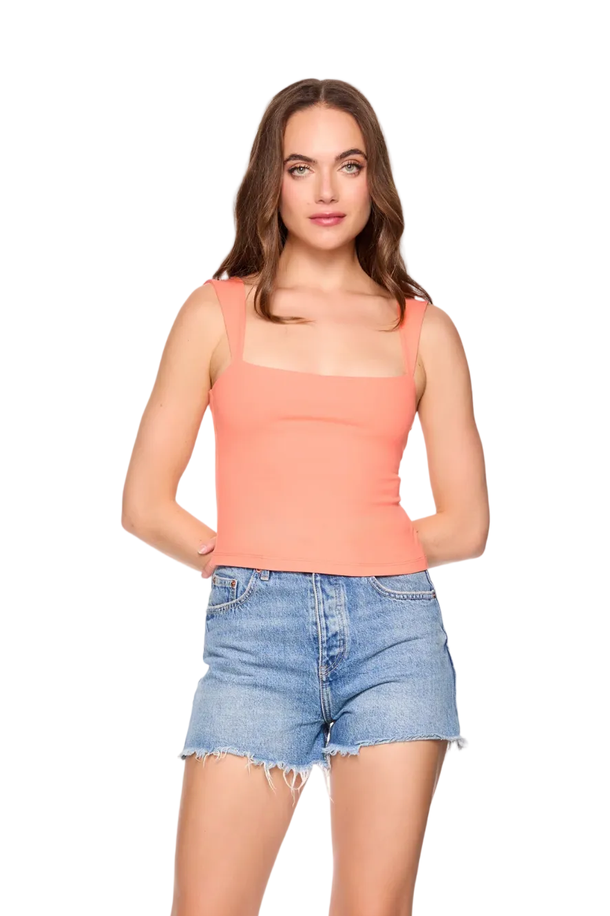 Susana Monaco angle strap tank top in stretch fabric with asymmetrical neckline and cropped fitted silhouette.
