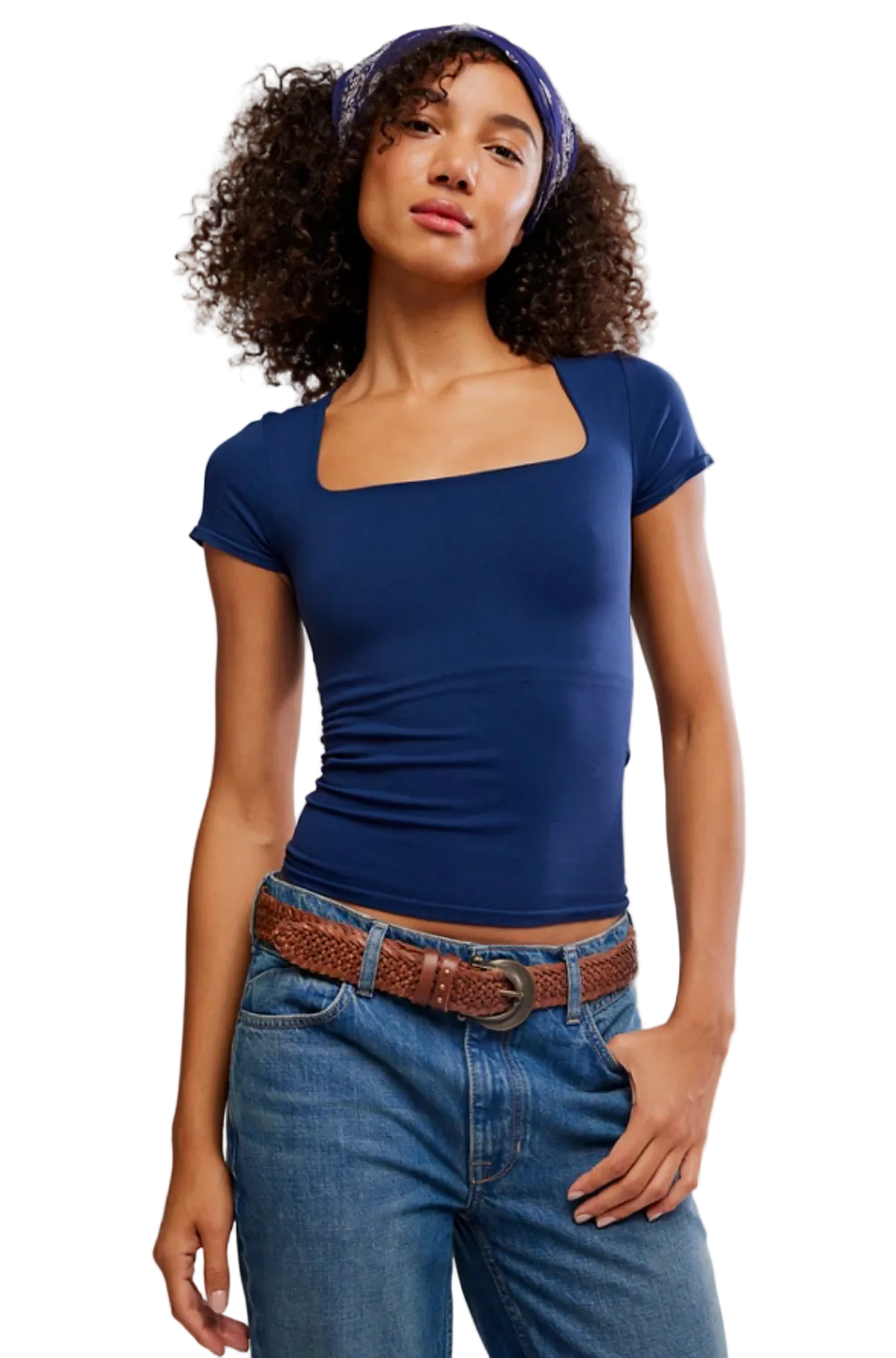 Woman wearing Free People Sunfade Clean Lines Baby Tee in navy with square neckline and slim seamless fit.