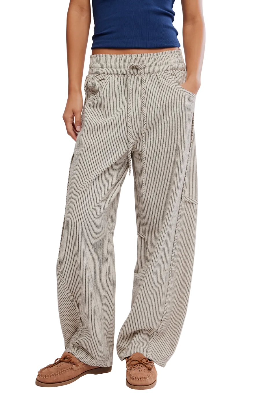 Woman wearing Free People Something Good Pull-On Barrel Pants in Ivory Stripe with relaxed barrel-leg silhouette and pull-on waistband.
